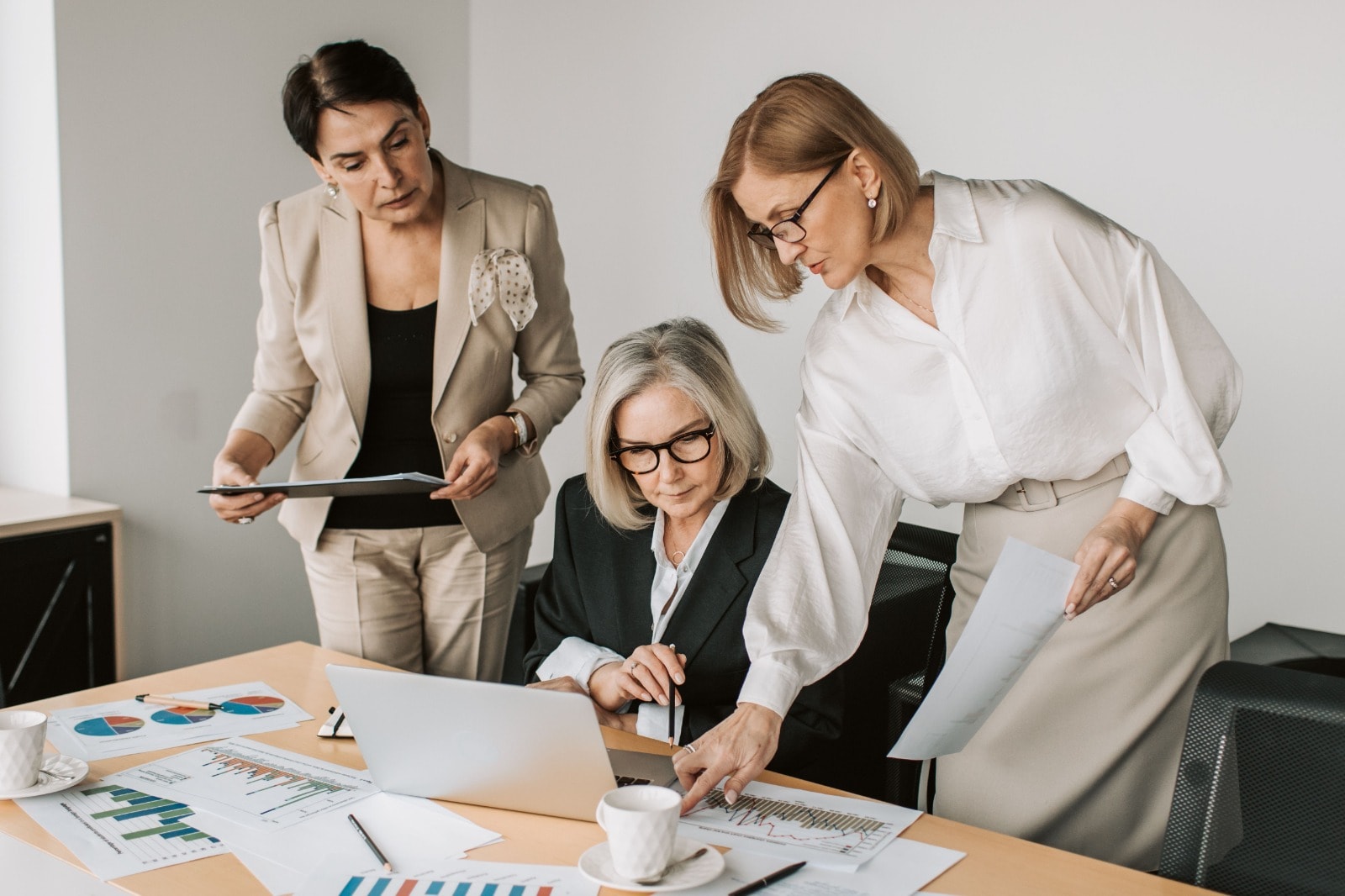 Environmental compliance and legal review documents being reviewed in an office